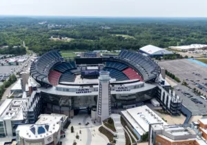 Drone photograph of Gillette Stadium showing the new North End Zone roof and Lighthouse.